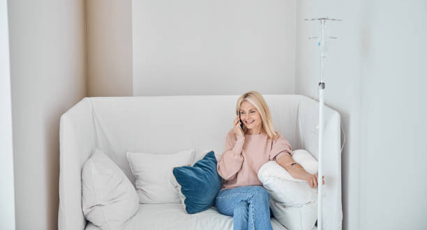 Woman on couch with IV